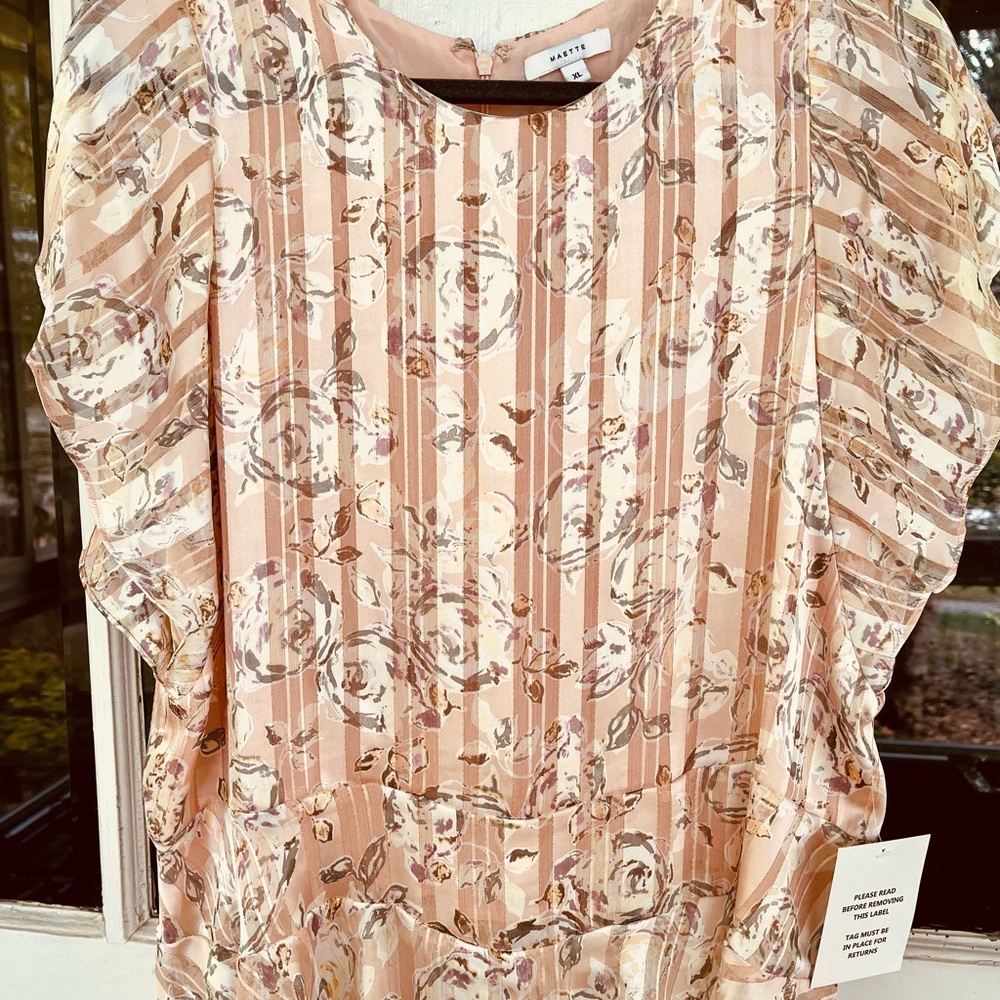 Stella & Dot Maette blush floral blouse with rose gold stitching.